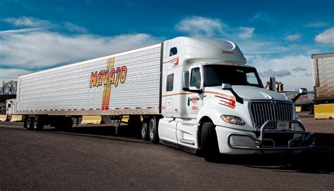 Navajo trucking - Pros. Friendly staff, new equipment, decent miles per week (but not great). Cons. Not all contracted loads. Expect brokers to call you. Very strict idling policy (it will effect your bonus). Pay is a little on the low side (start pay .43/mile and .2/mile monthly safety bonus). 1. Helpful.